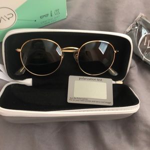 Brand New Polarized Sunglasses/ still in package
